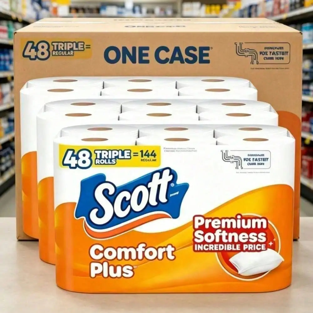 A large case of toilet paper rolls in orange packaging featuring premium softness branding