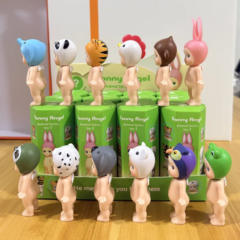 Collection of twelve miniature animal-themed figurines seen from the side, standing in front of their green packaging boxes