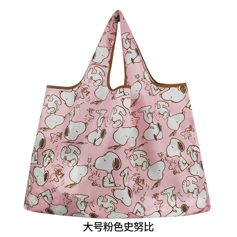 A pink foldable shopping bag with a cartoon dog print.