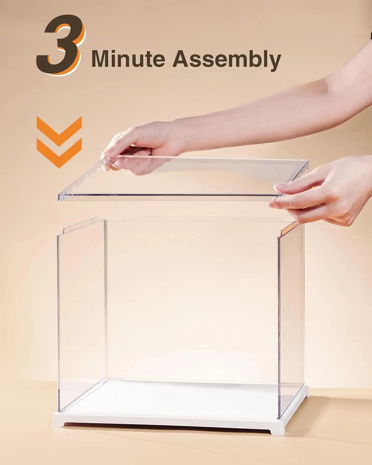 Hands assembling a clear acrylic display case for a miniature model