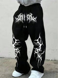 Black loose sweatpants with gothic-style white print