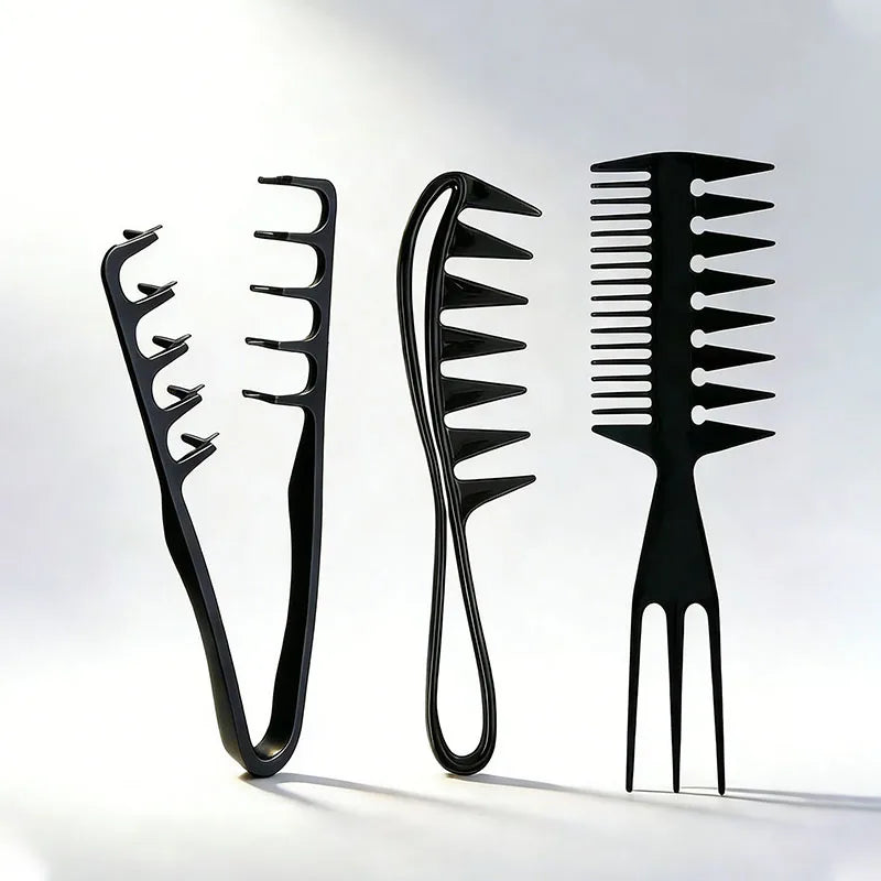 Set of three black plastic hair styling combs on a plain background