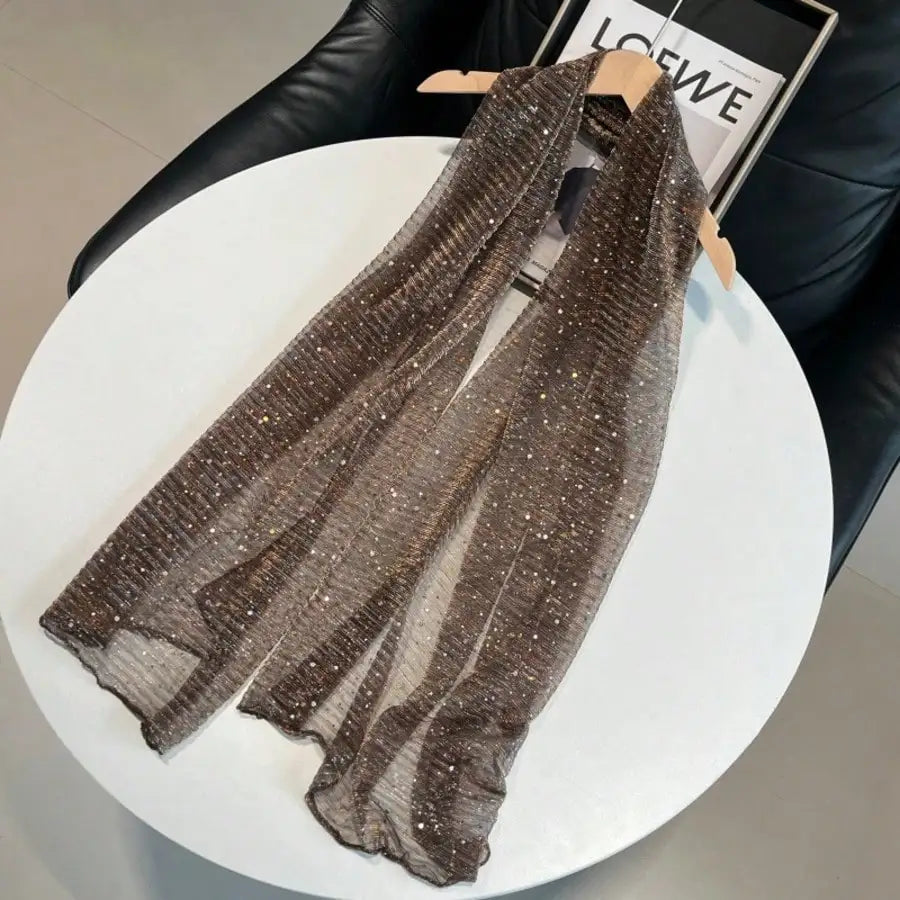 Brown sequin lightweight scarf on a hanger