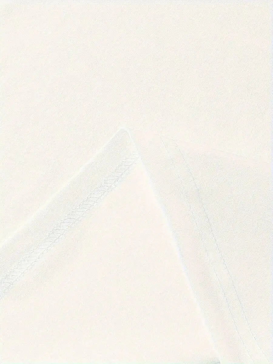 Close-up of the fabric seam on a white t-shirt