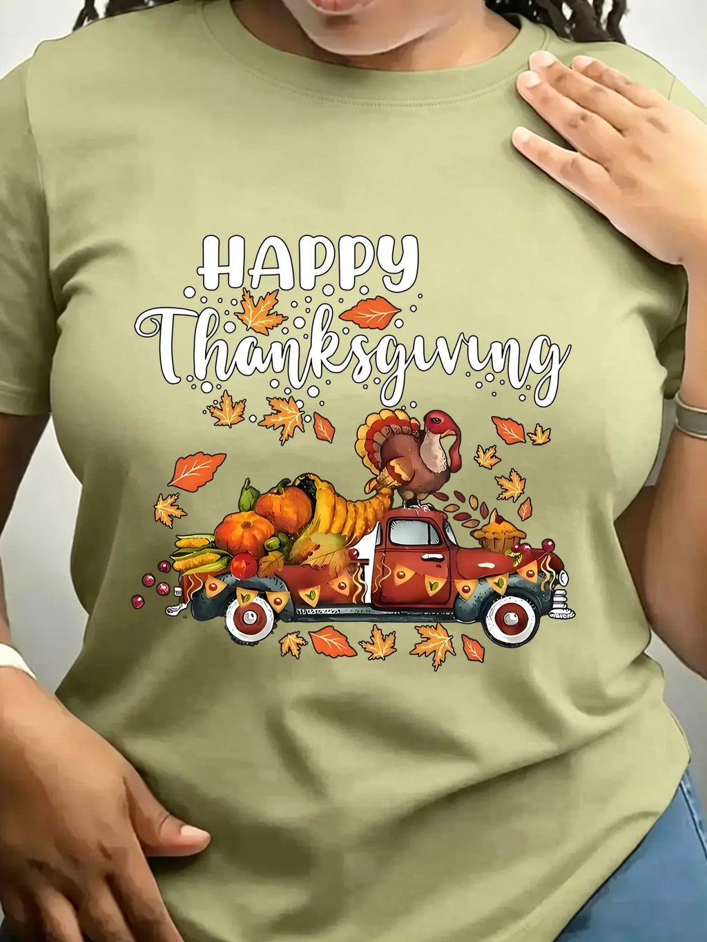 Olive green crew neck t-shirt with a vintage truck carrying a turkey and autumn harvest illustration