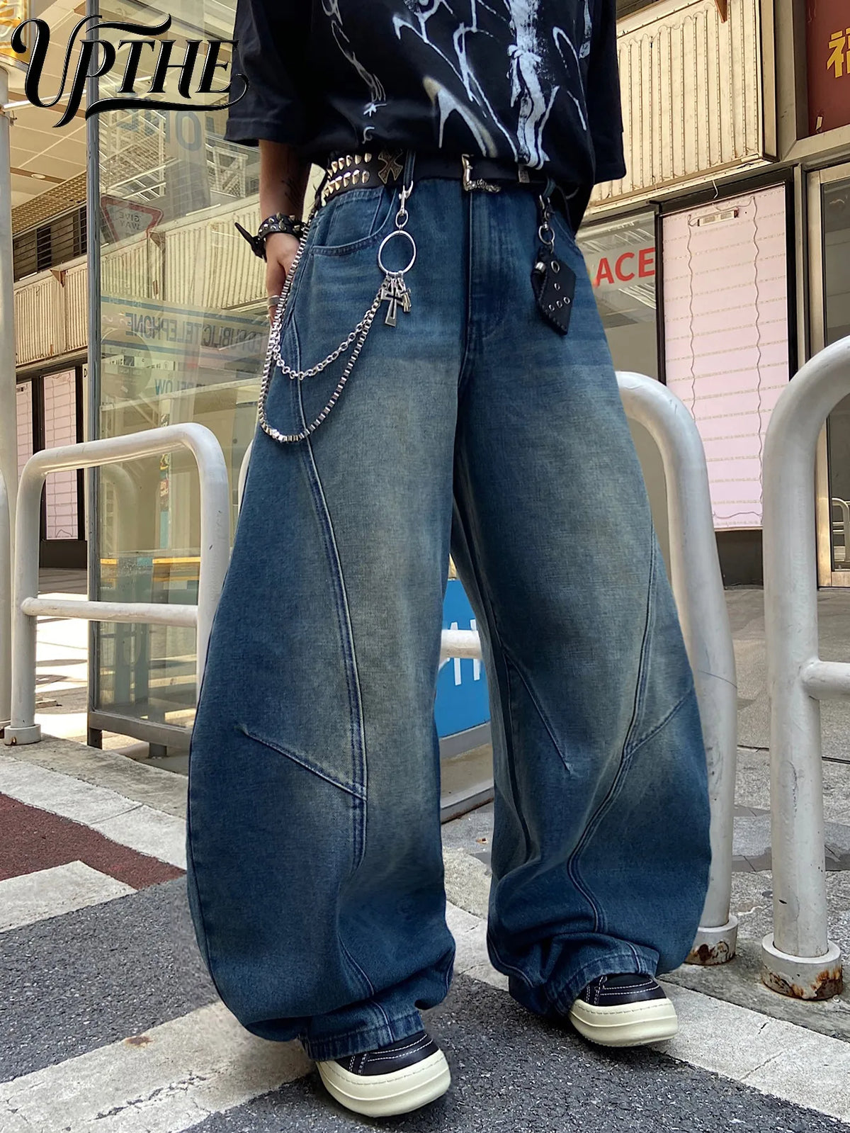 Men's vintage blue baggy wide-leg jeans with chain accessory and spliced design