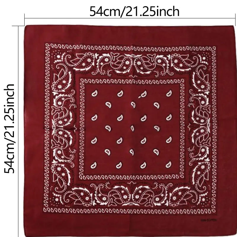A red square bandana laid flat with dimension measurements in centimeters and inches.