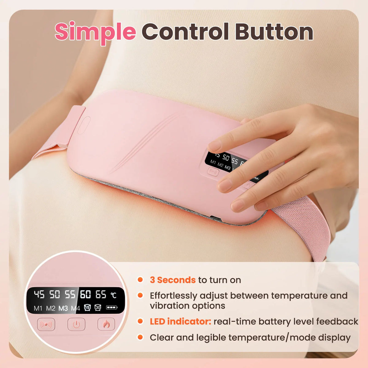 Close-up of a hand using the control button on a pink electric menstrual heating belt