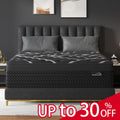 Sweetlove hybrid mattress with memory foam and pocket springs shown in a bedroom setting.