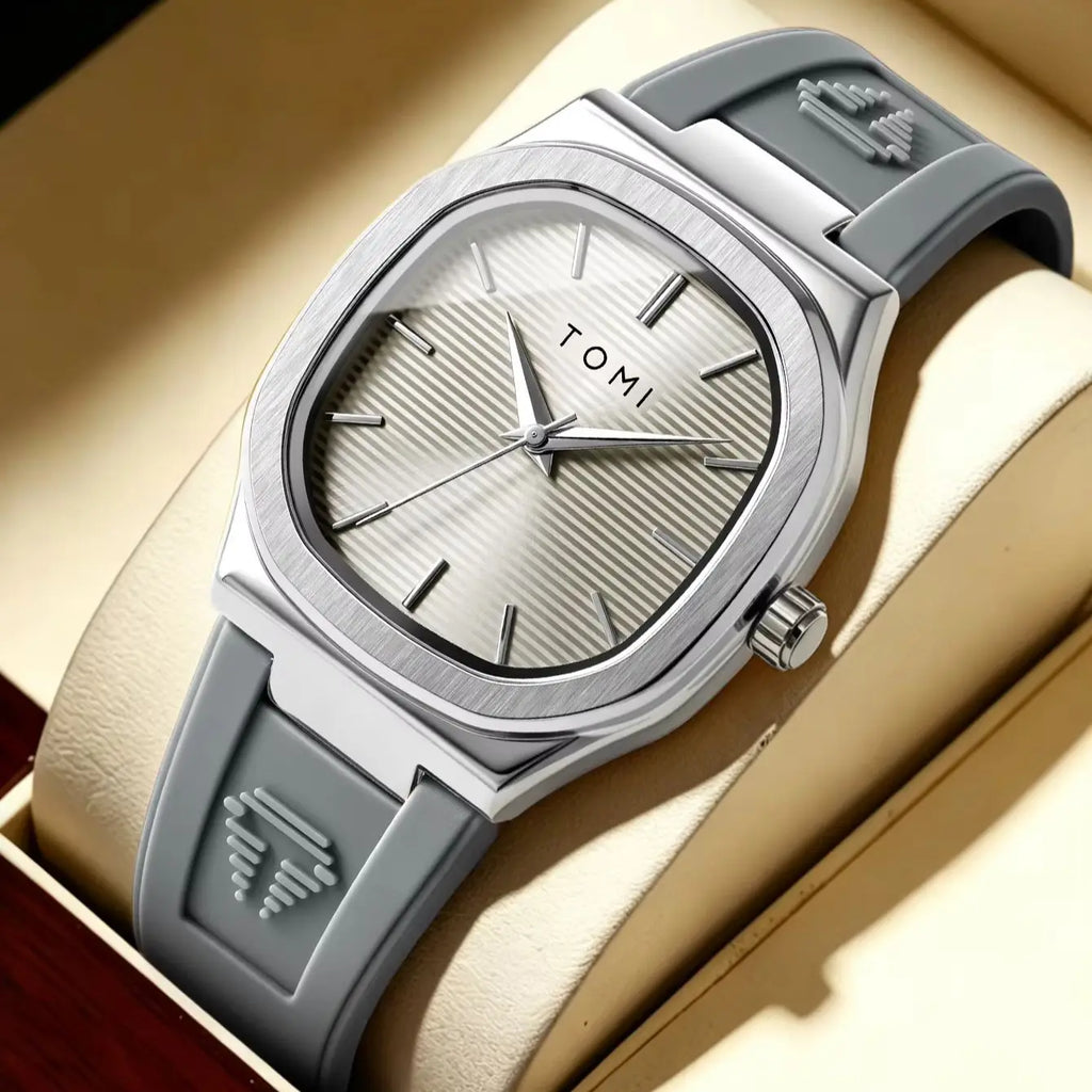 Silver square dial watch with grey rubber strap in a presentation box
