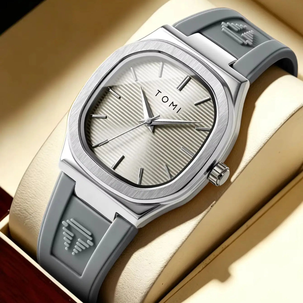 Silver square dial watch with grey rubber strap in a presentation box