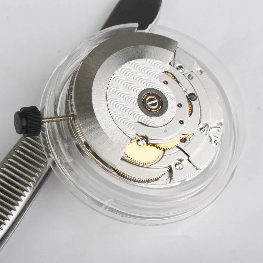 Automatic watch movement mechanism with silver rotor and plastic holder