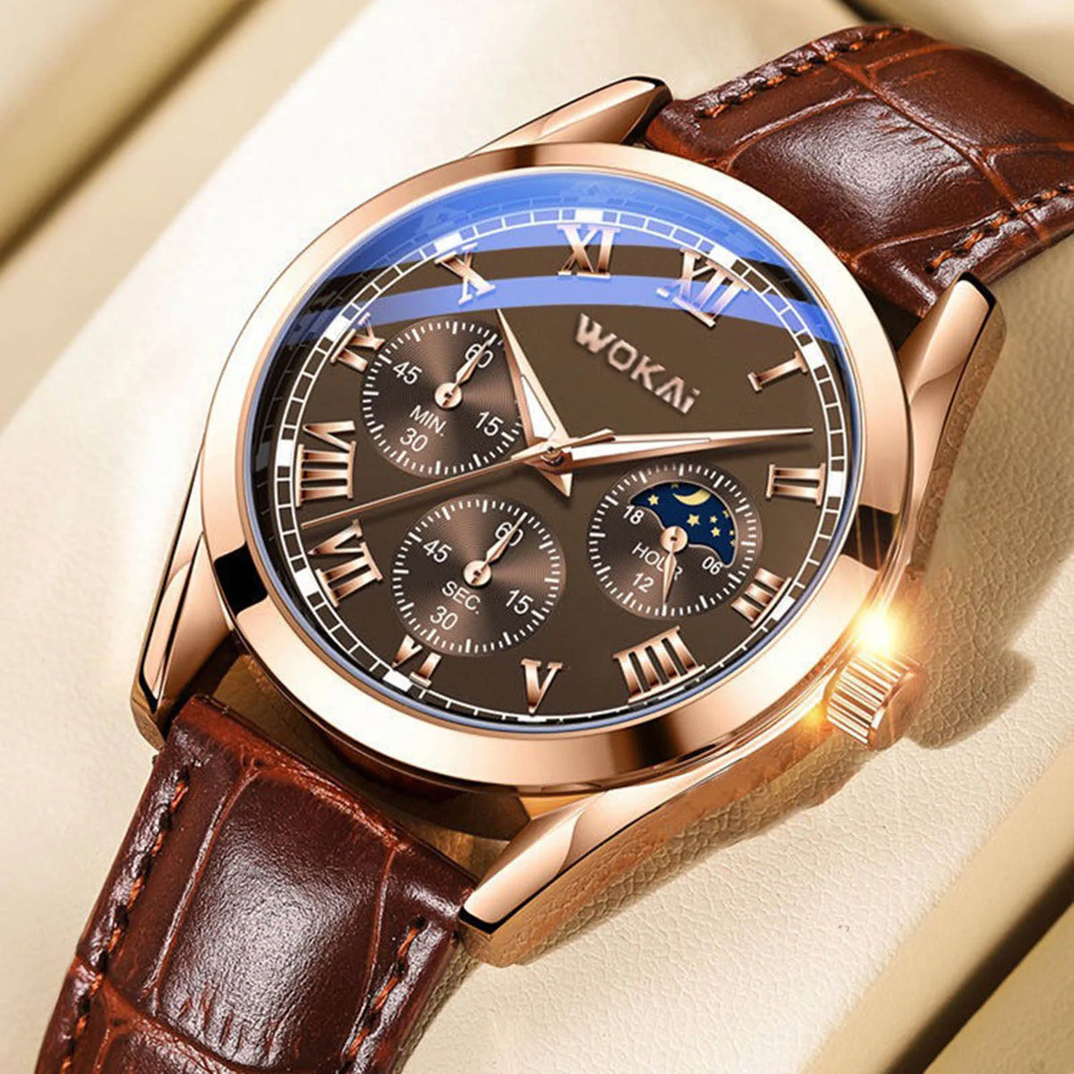 Rose gold tone quartz watch with brown leather strap and roman numeral markers