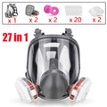 Full face respirator gas mask with various filter components and accessories.