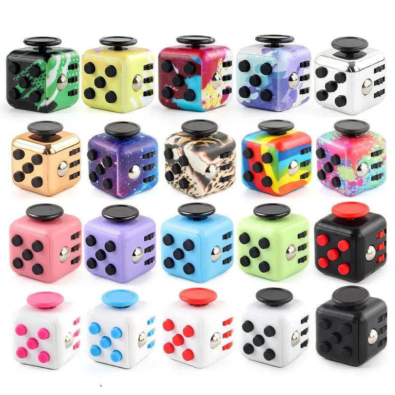 A collection of colorful fidget cubes with various textures and patterns.