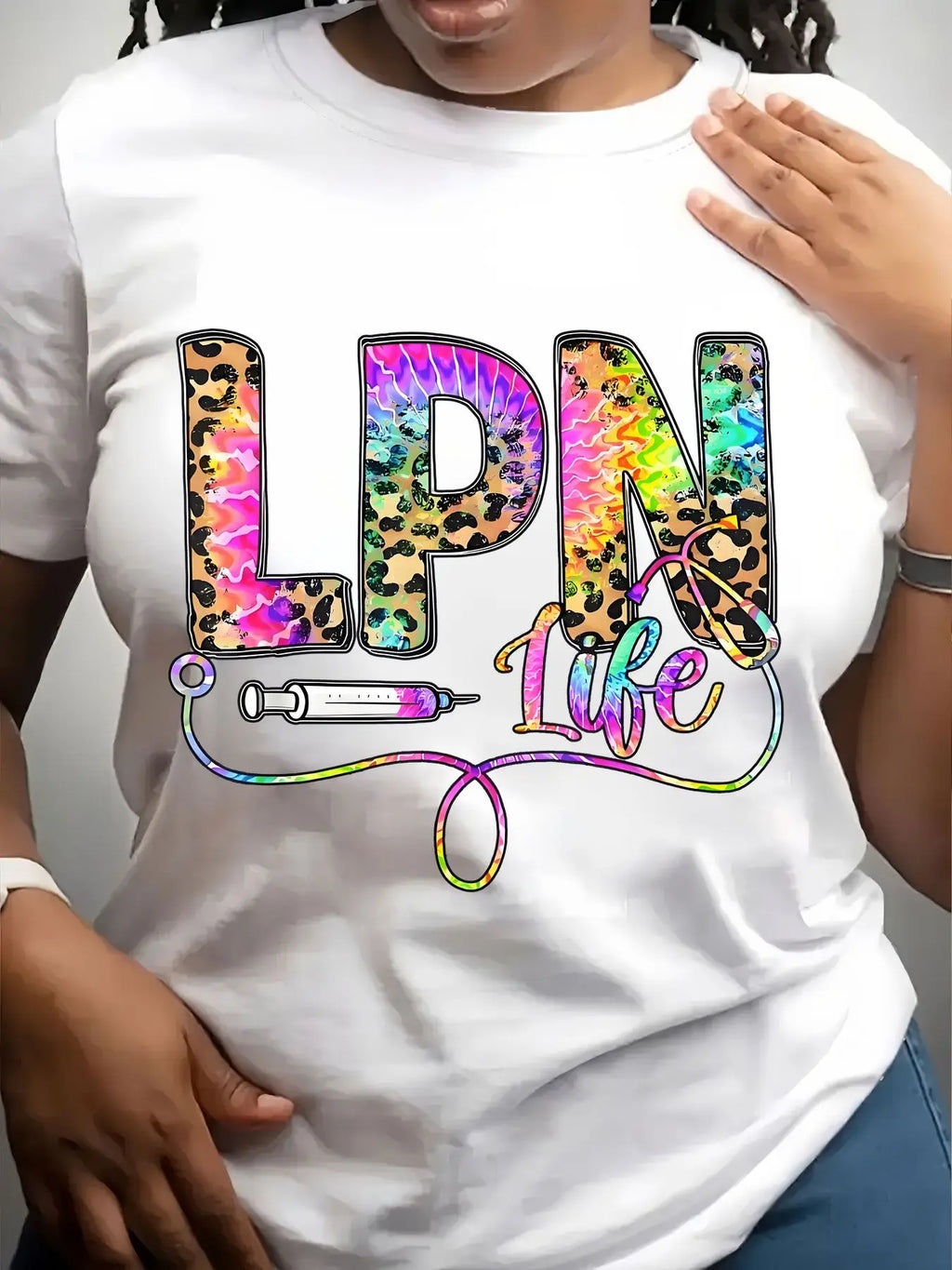 White crew neck t-shirt with leopard and tie-dye graphic text reading LPN Life featuring a syringe and stethoscope
