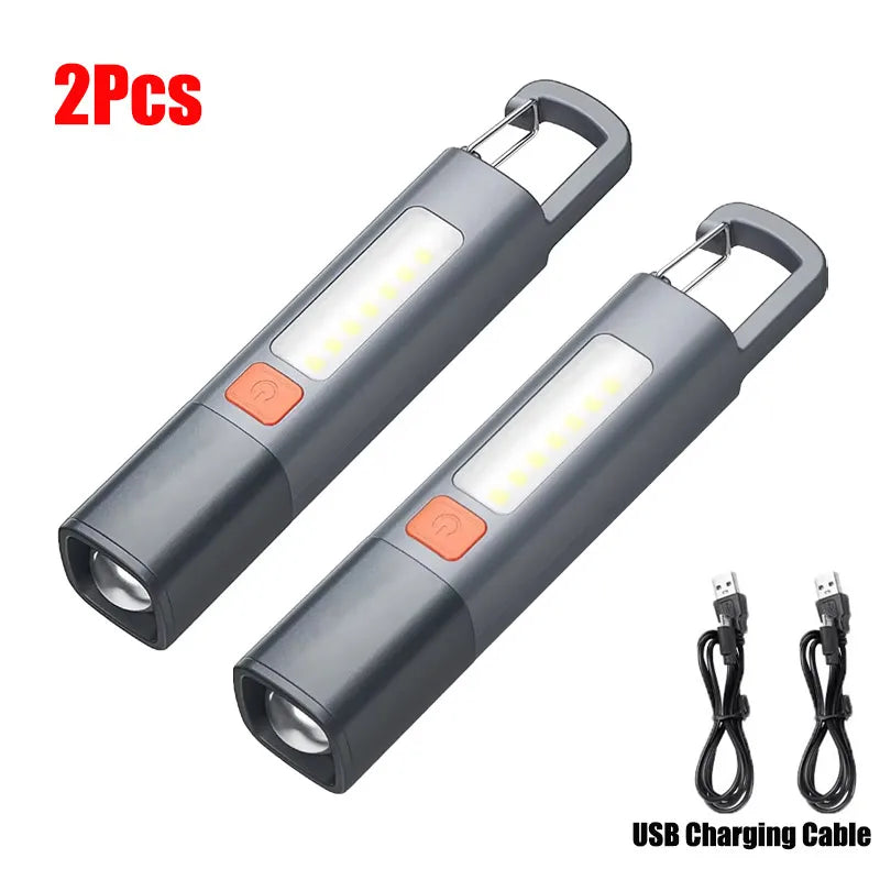 Set of two grey LED flashlights with included USB charging cables