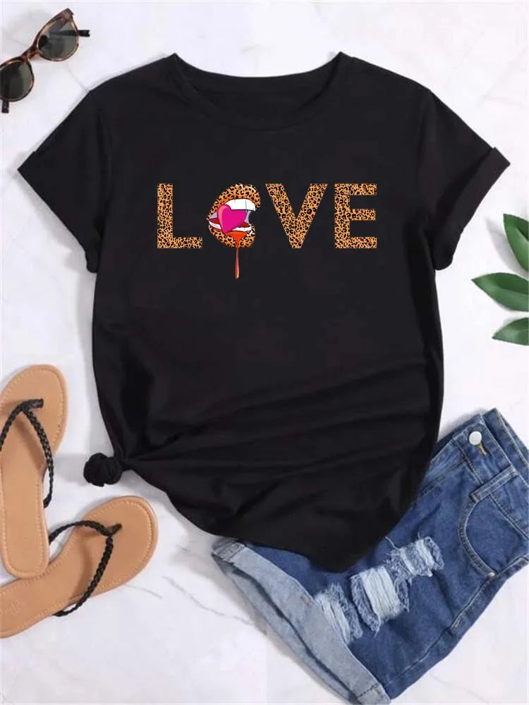 Black short sleeve t-shirt with leopard print lips graphic, paired with denim shorts and sandals