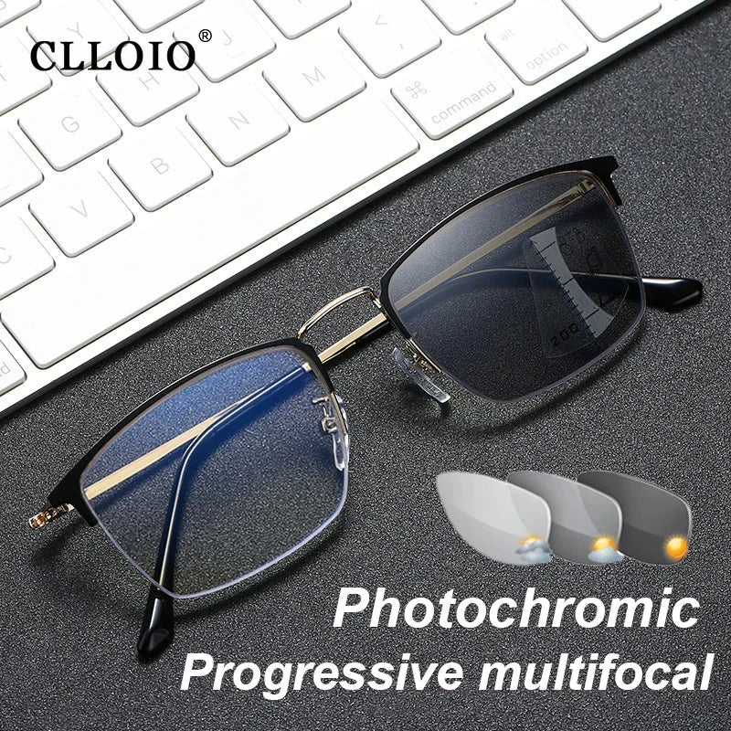 Black and gold semi-rimless photochromic progressive multifocal glasses on a keyboard background.