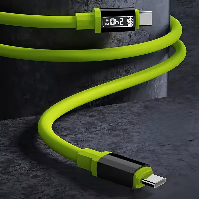 Green coiled USB-C cable with a digital power display on the connector plug.