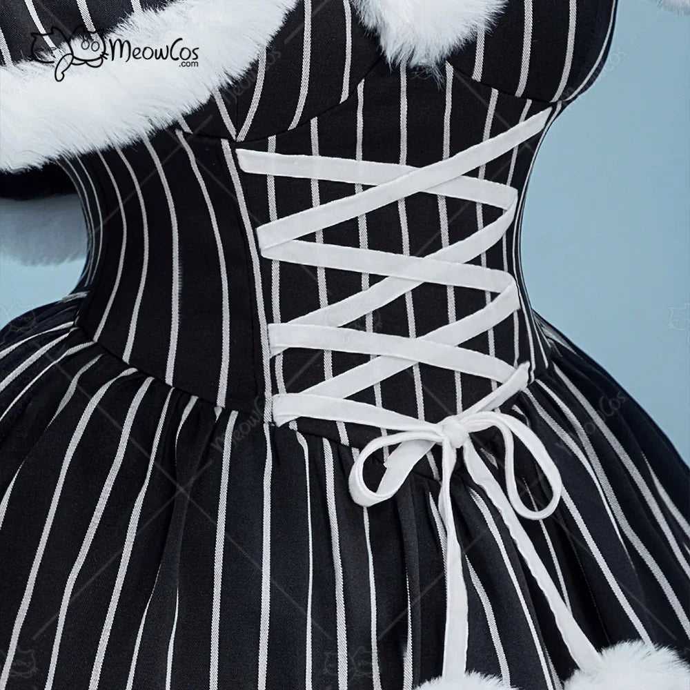 Close-up of a white lace-up corset detail on a black and white striped gothic dress