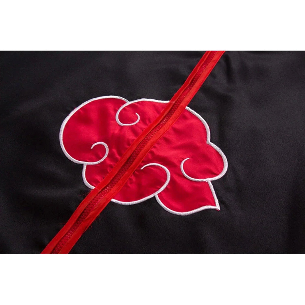 Close-up of a red cloud pattern on a black cloak for cosplay
