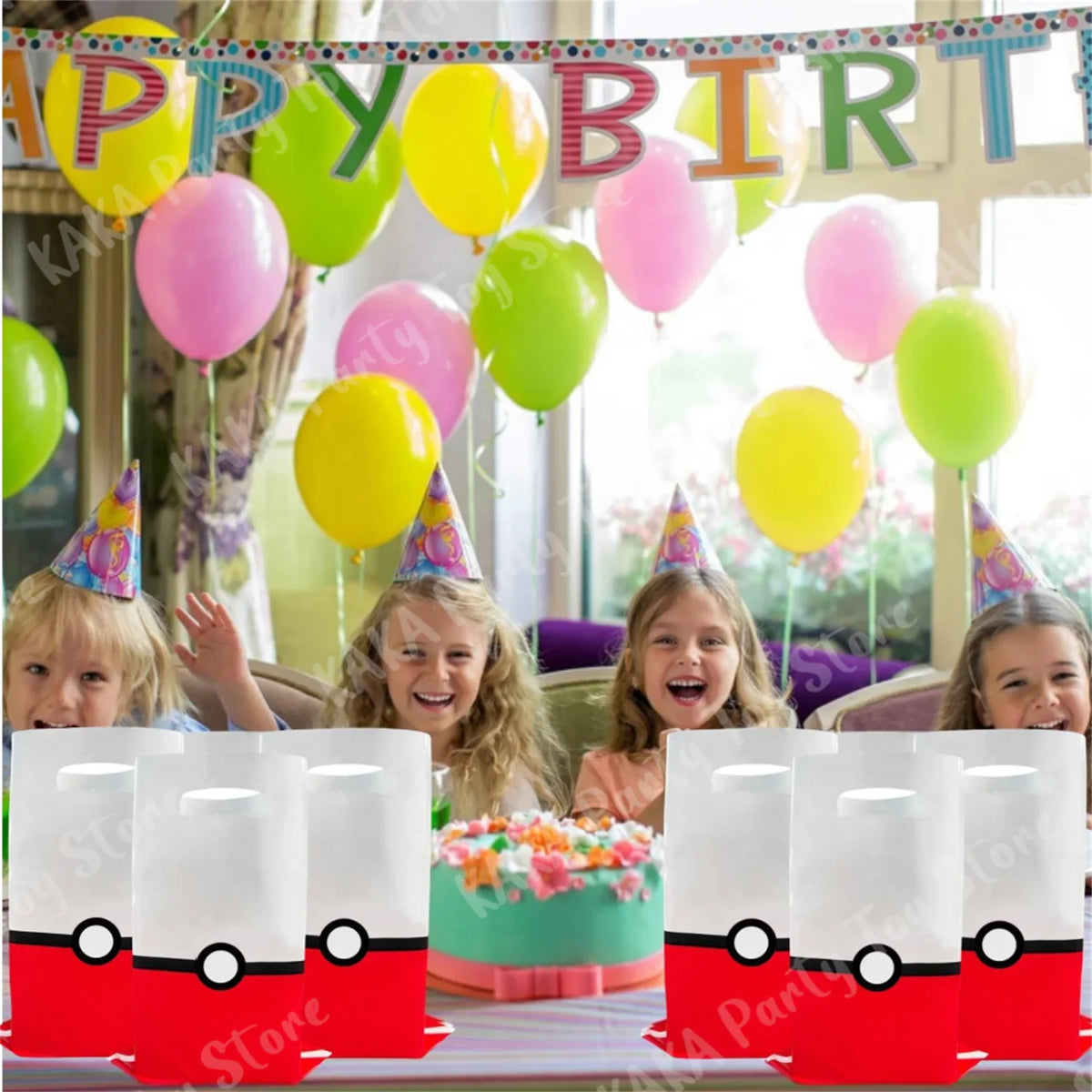 Children at a birthday celebration with balloons and pokeball theme gift bags