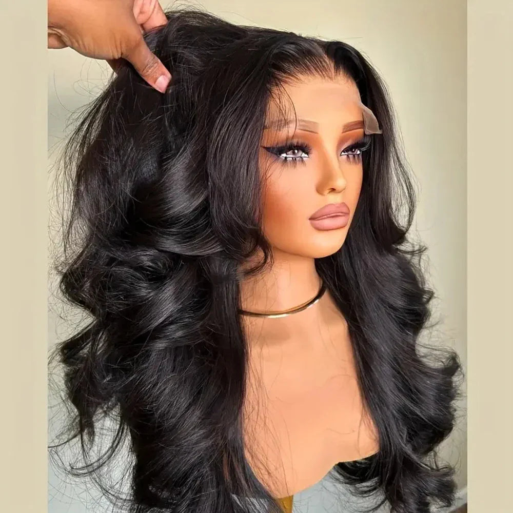 A mannequin head displaying a long black wavy lace front wig.
