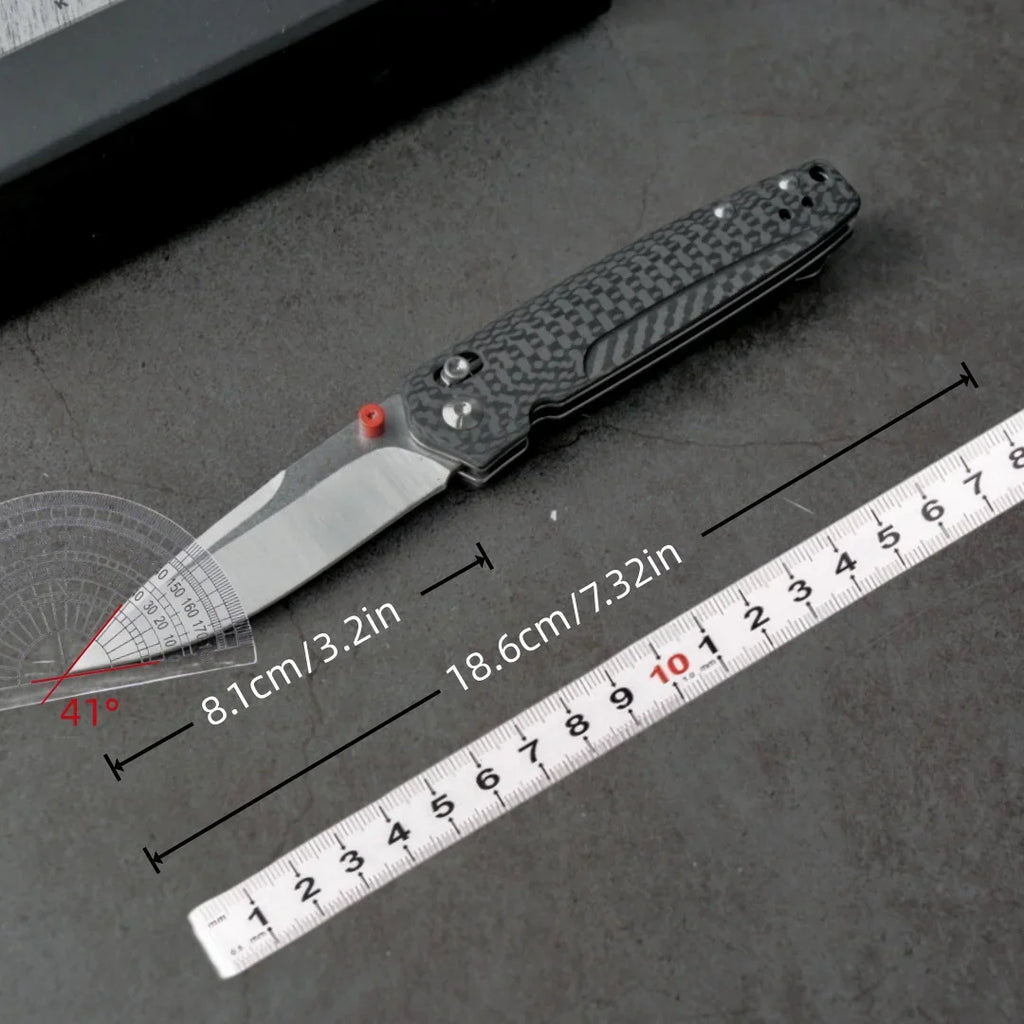 Tactical folding knife with a ruler and protractor showing measurements