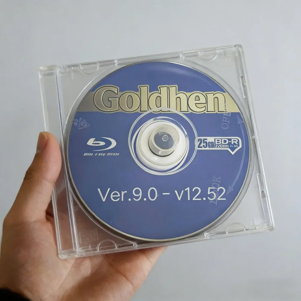 Hand holding a blue ray disc for video game console jailbreak in a clear plastic jewel case