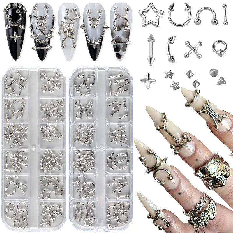 Set of assorted silver metallic gothic nail charms including stars, spikes, and hoops with display cases