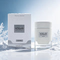 White perfume bottle and packaging in a snowy, icy setting