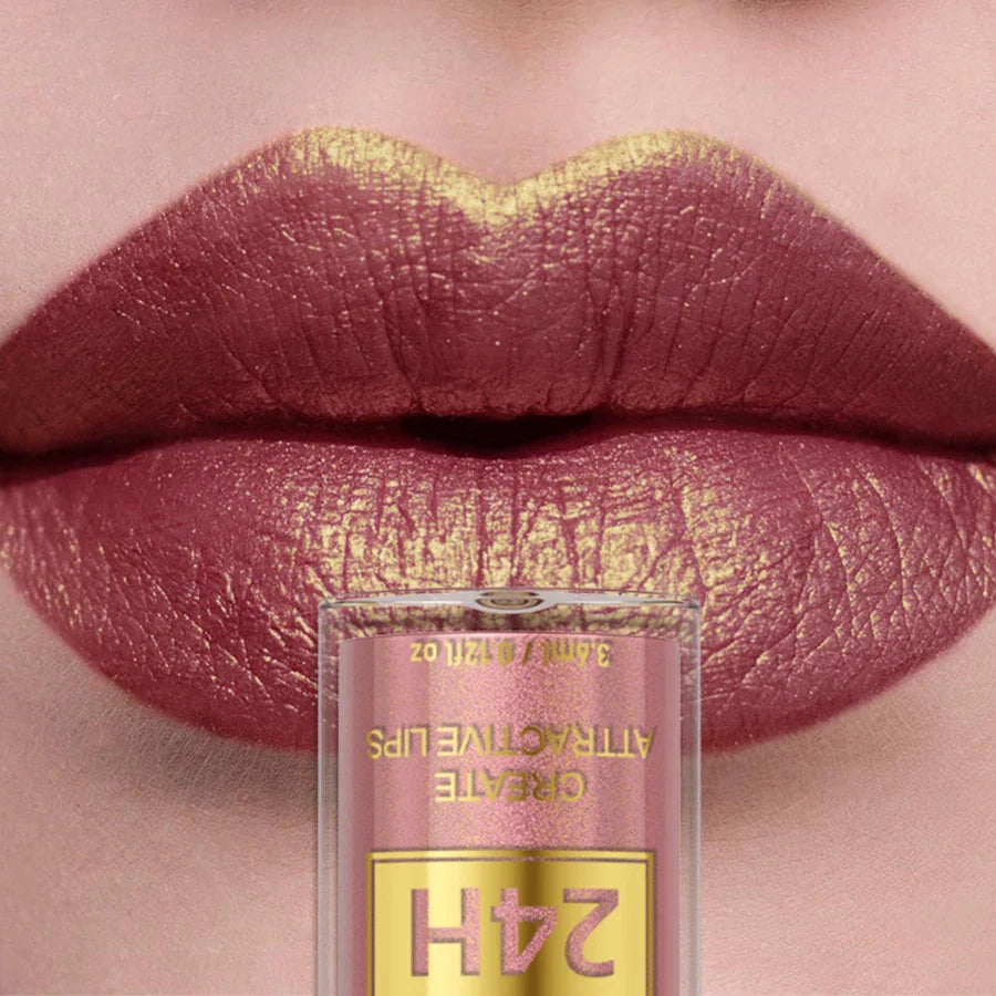 A liquid lipstick bottle placed over lips showing a metallic pink shimmer finish.