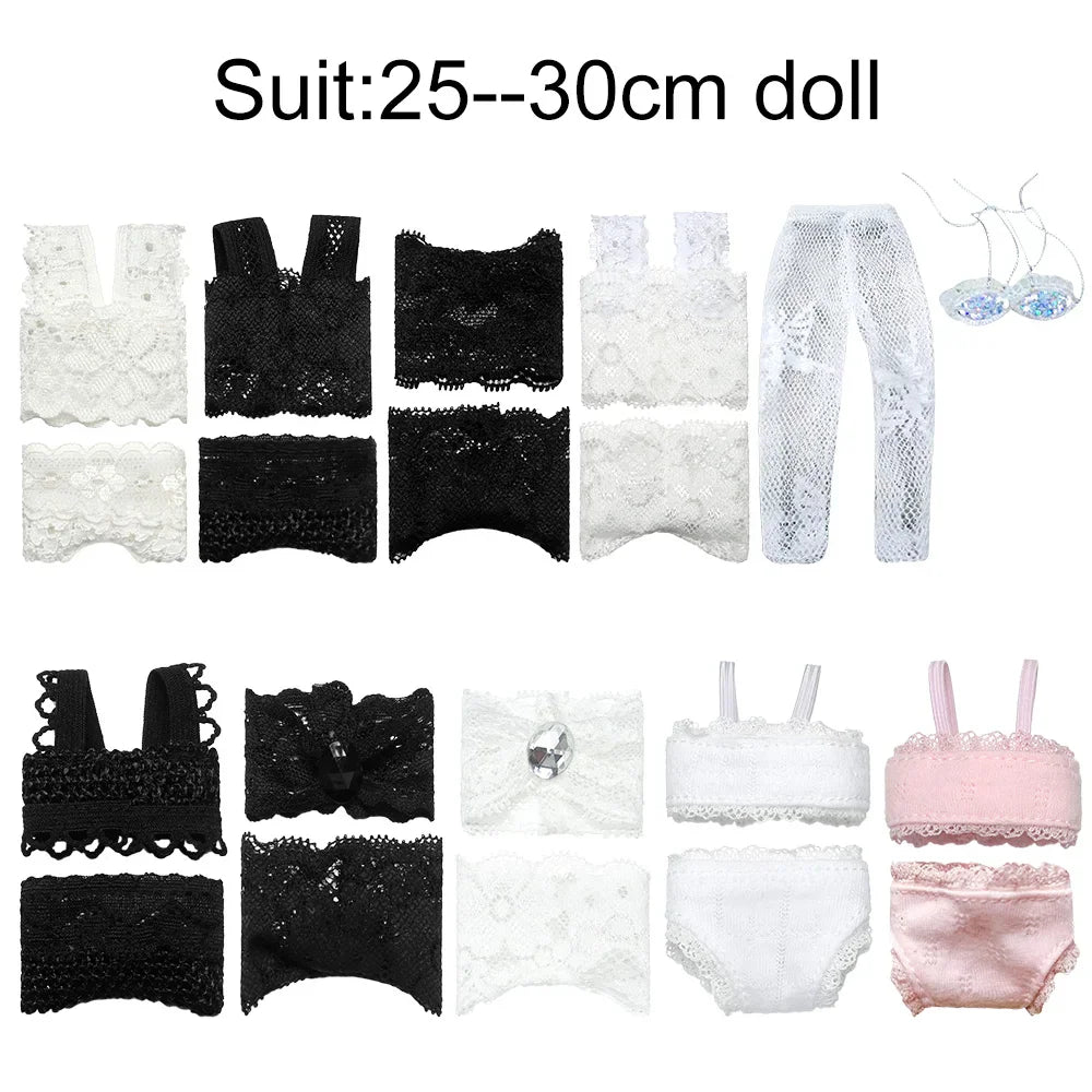 A collection of lace doll lingerie sets with a label indicating they fit dolls 25 to 30 cm.