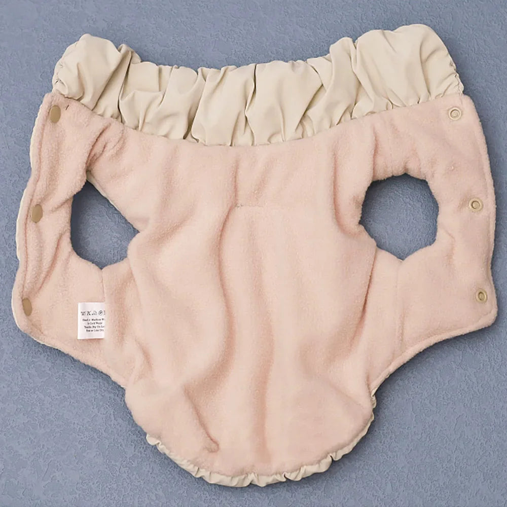 Interior view of a beige quilted dog winter coat