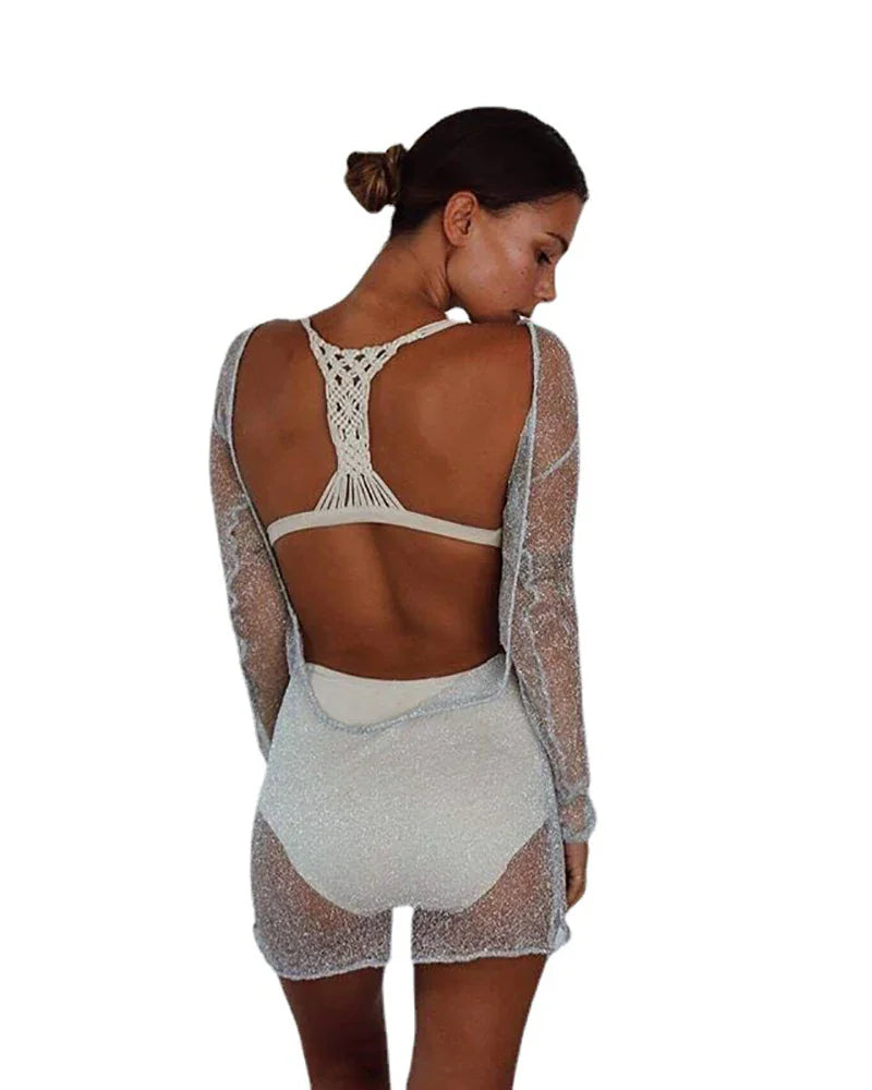 Silver metallic sheer mesh long-sleeved cover-up top on a woman from behind