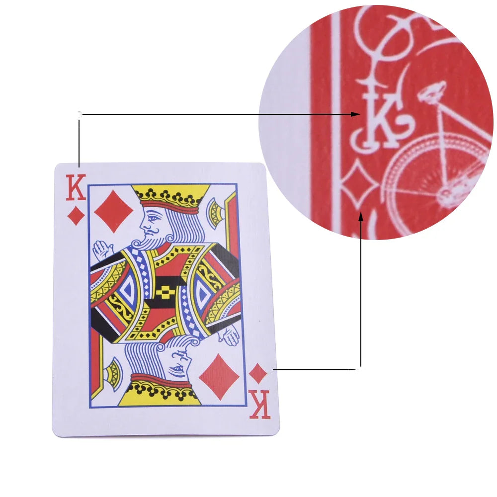 King of diamonds playing card with a zoomed-in section showing the back design and marking.