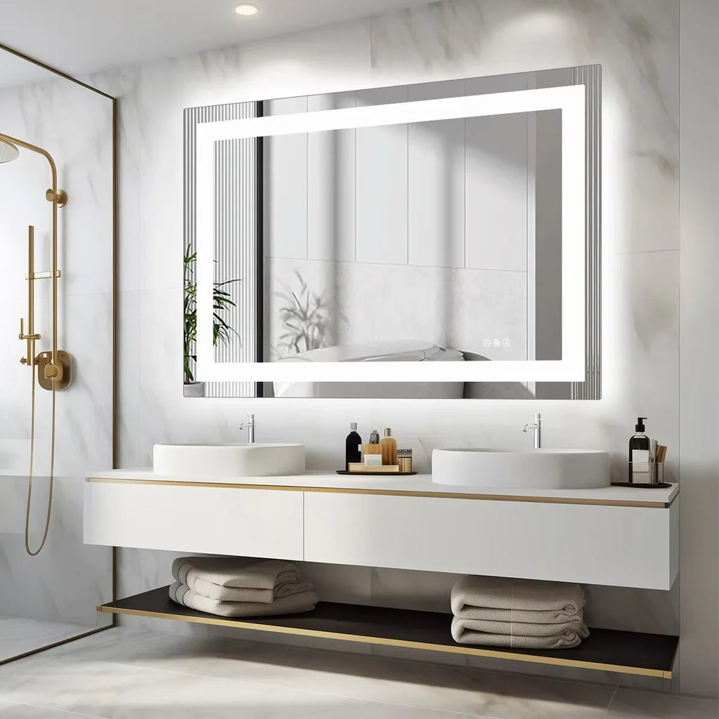 Rectangular LED bathroom vanity mirror with front light in a marble bathroom with double sink