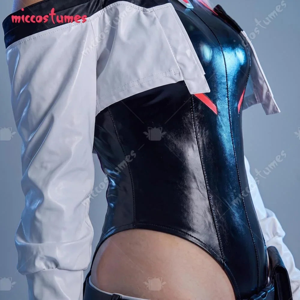 Close-up of a black and white cyberpunk-style leotard costume showing the material texture.