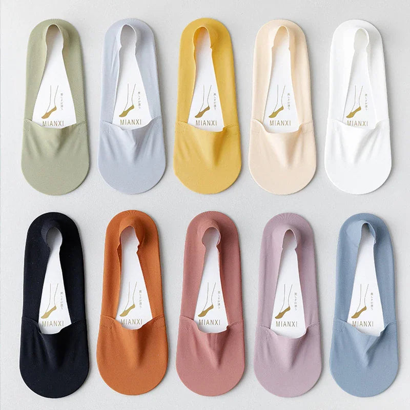 Set of ten solid color invisible liner socks in various shades arranged in two rows