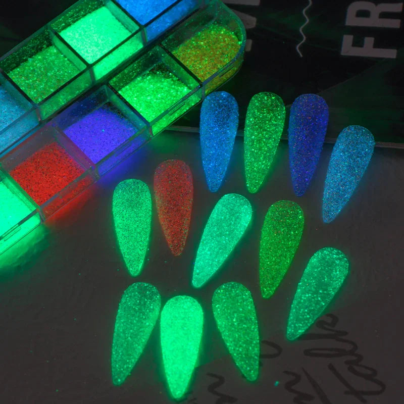 12-grid set of luminous nail glitter powder with examples of glowing nail tips