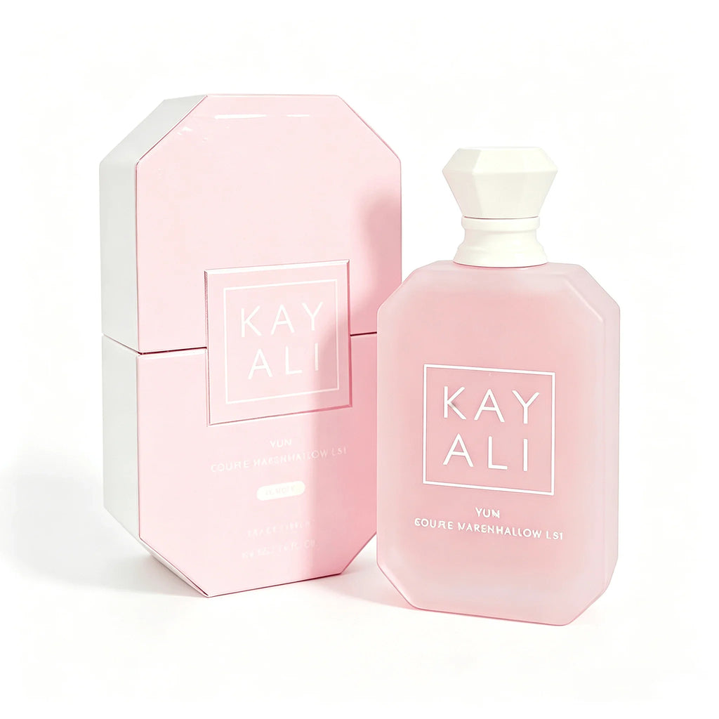 A pink perfume bottle next to its matching packaging box.