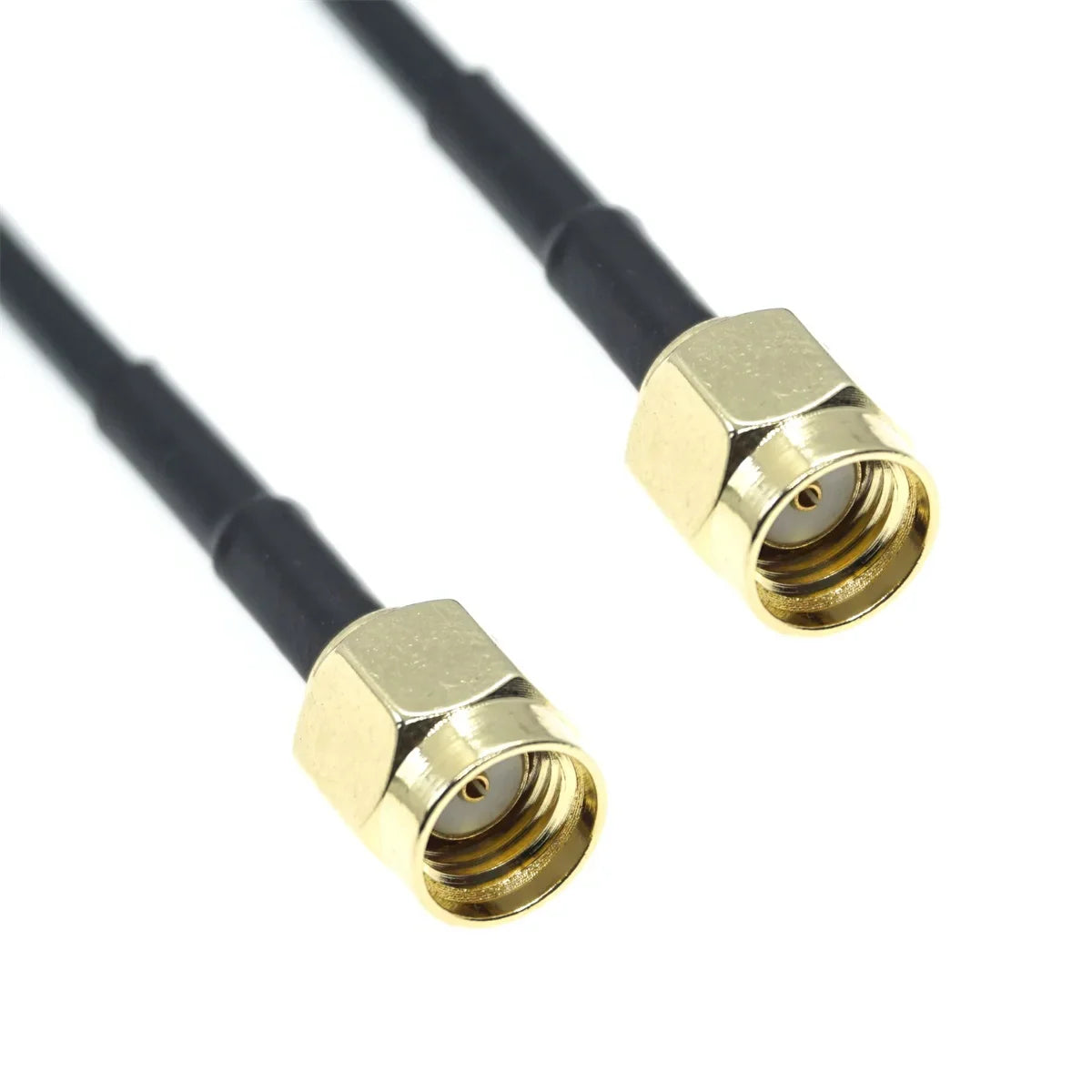 Close up of gold SMA connectors on black coaxial cable