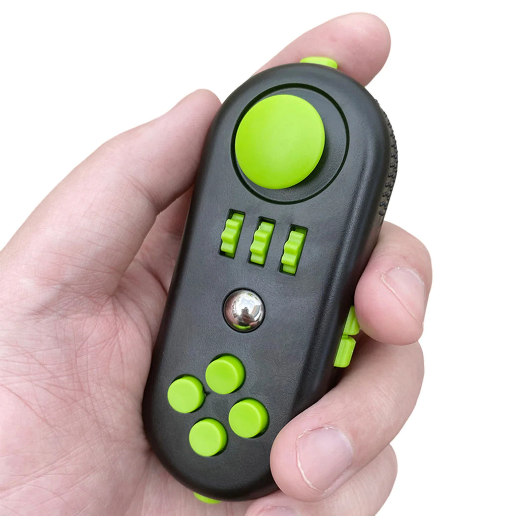 Hand holding a black and neon green fidget controller toy