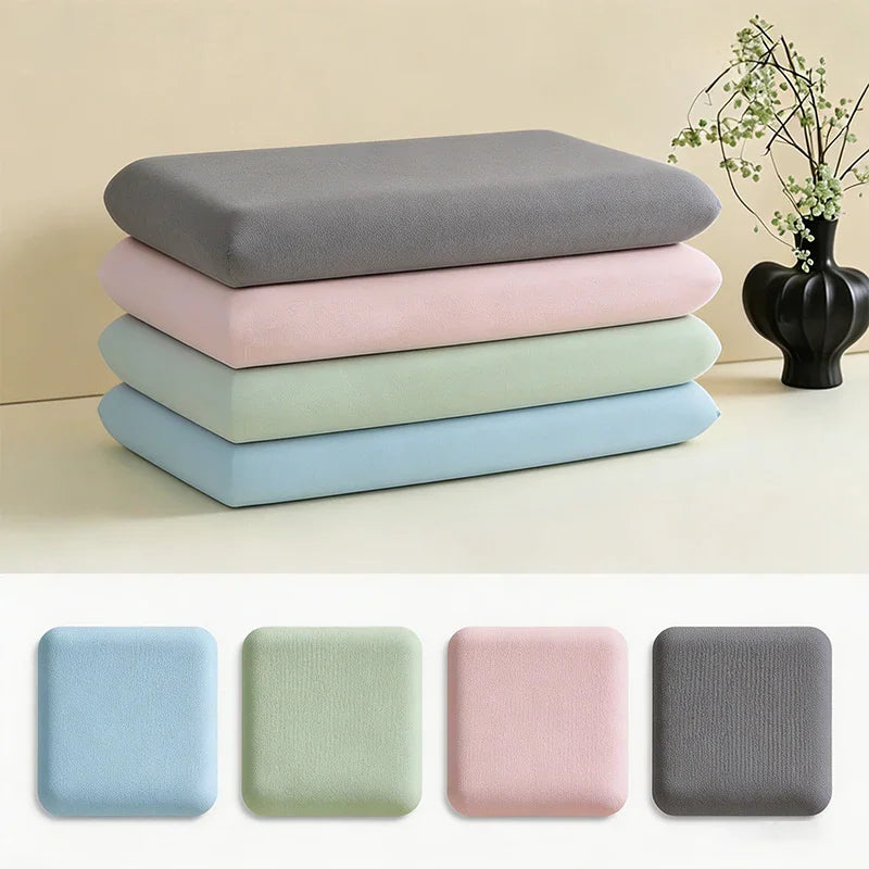 A stack of cooling pillowcases in four colors and individual swatches