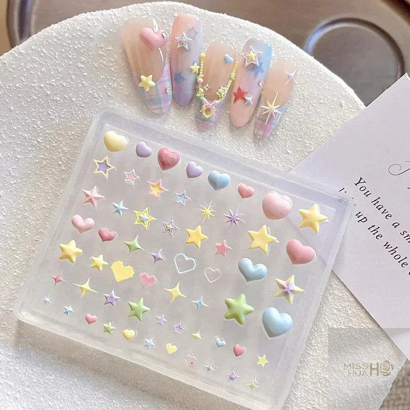 Transparent silicone mold for 3D heart and star nail art decorations with finished sample nails