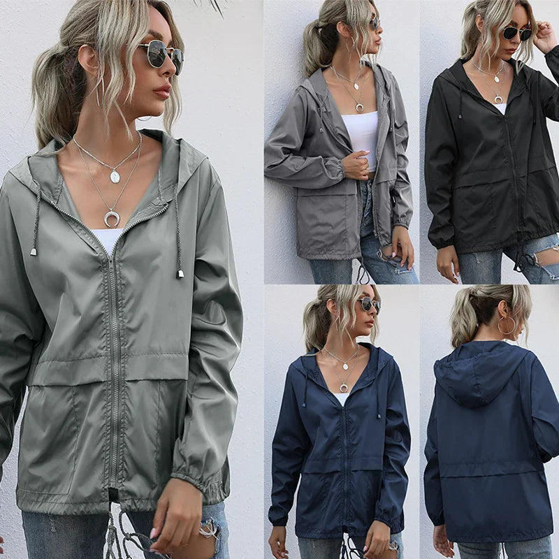 Collection of different colors of zip-up hooded windbreaker jackets