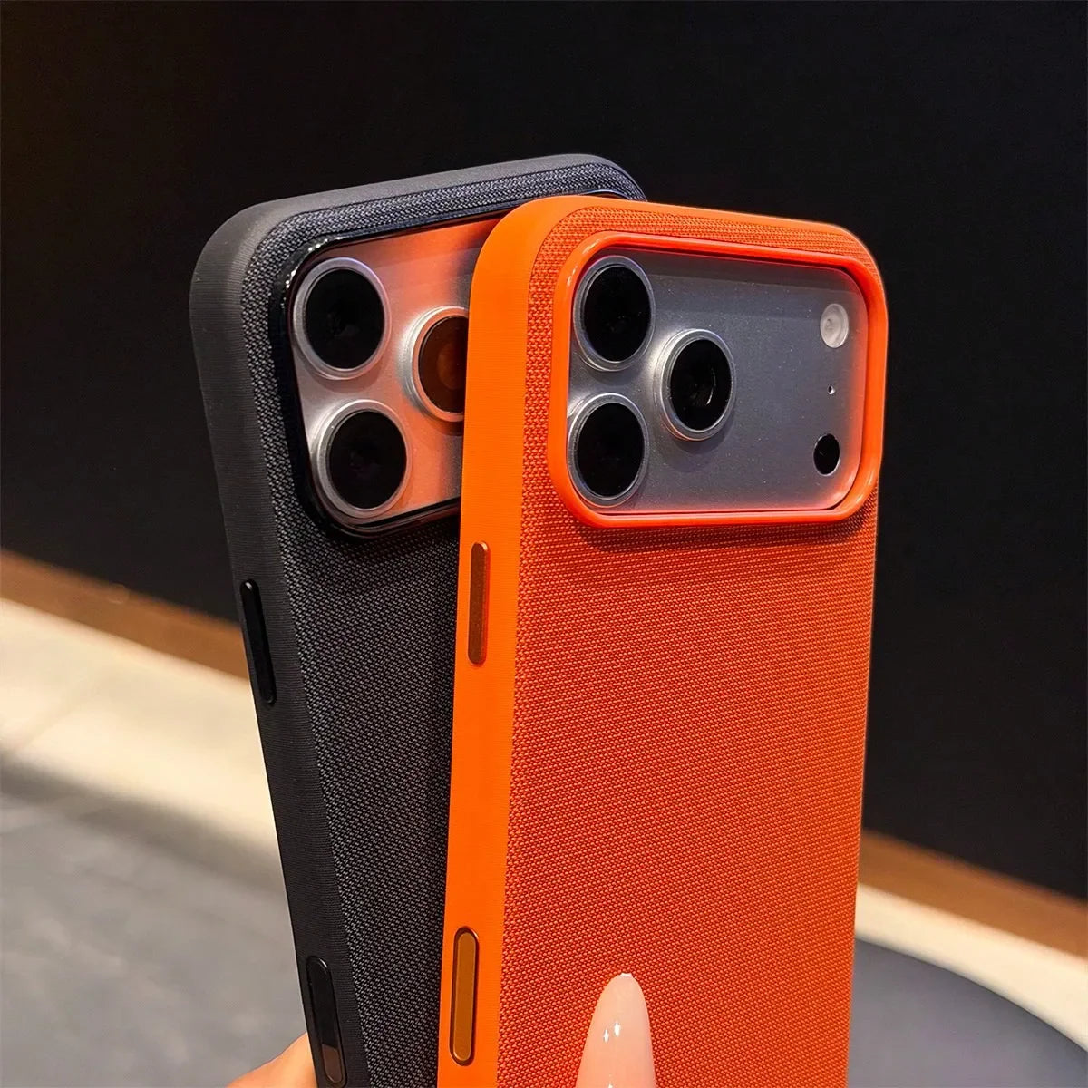 Orange and black woven fabric protective phone cases side view
