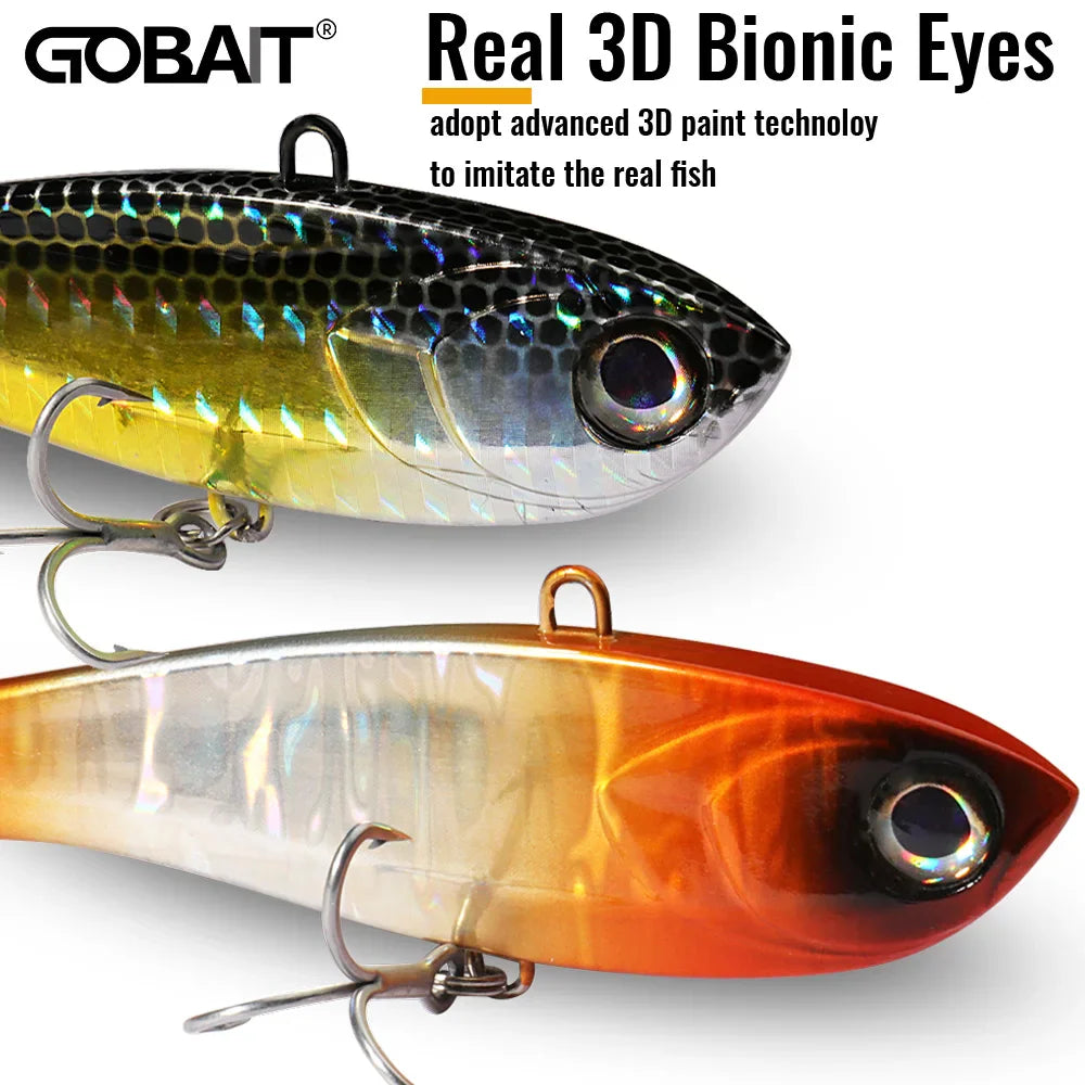 Close up of two metallic fishing lures with 3D eyes