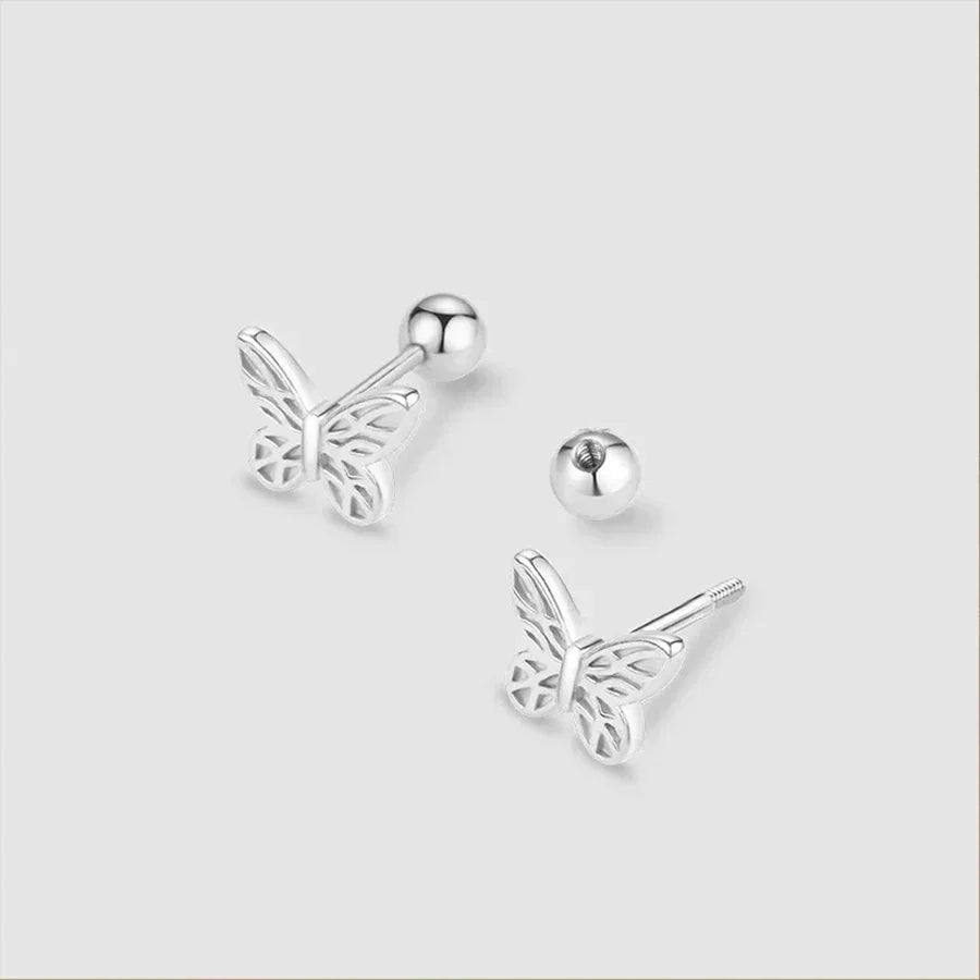 A pair of intricate silver openwork butterfly stud earrings